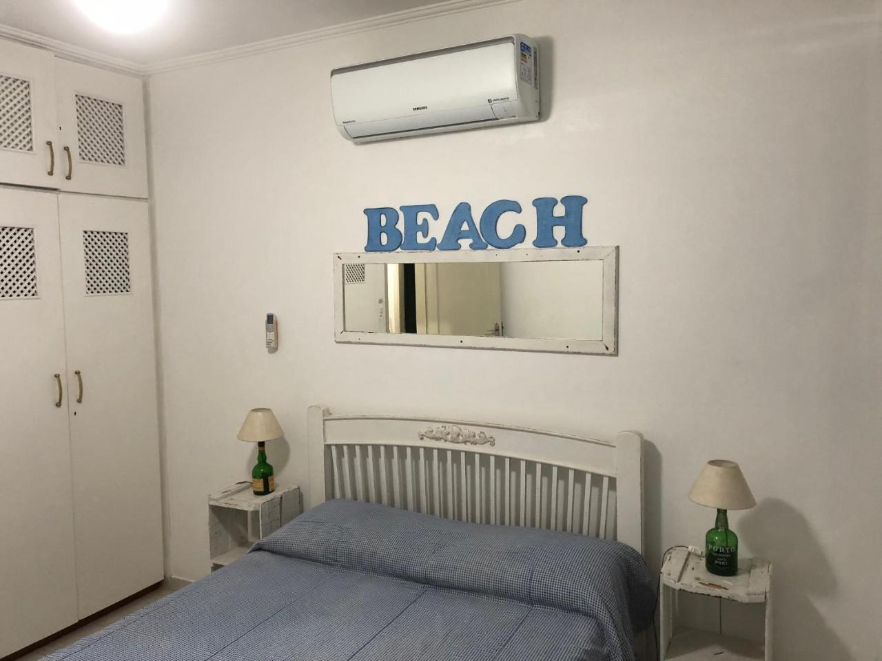 Apto com Ar condicionado a 200 m da praia - atrás do Shopping Enseada Apartamento Guarujá Exterior foto